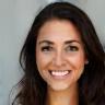Professional photo of Maria Garcia with a warm smile.